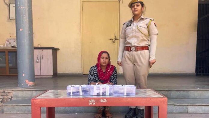 Woman smuggler arrested with two country made pistols and ten live cartridges