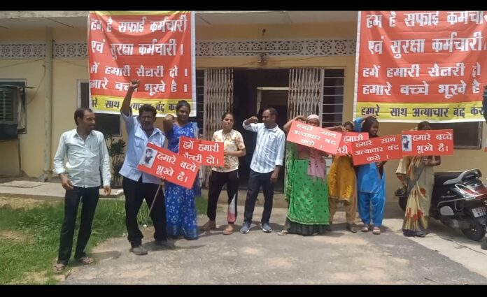 Angry cleaning and security workers protested due to non-payment of salary