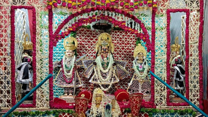On Nag Panchami, a flower bungalow tableau decorated on the theme of peacock