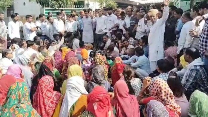Families from twelve colonies affected by Sector Road staged a sit-in protest