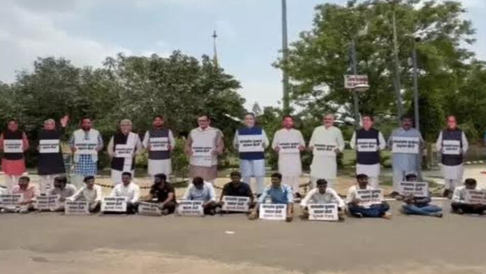 Students demonstrated with cut-outs of politicians demanding student union elections