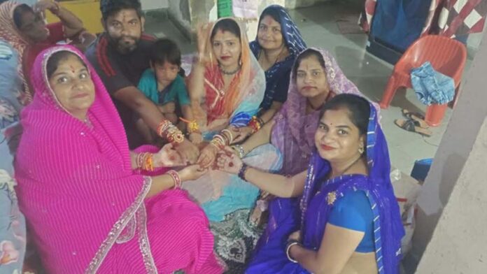 The process of tying Rakhi continued throughout the day amidst light showers
