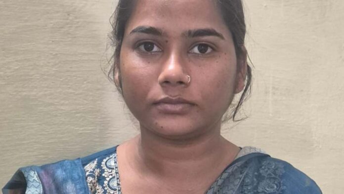 A young woman who was absconding for two years in a blackmailing case was arrested.