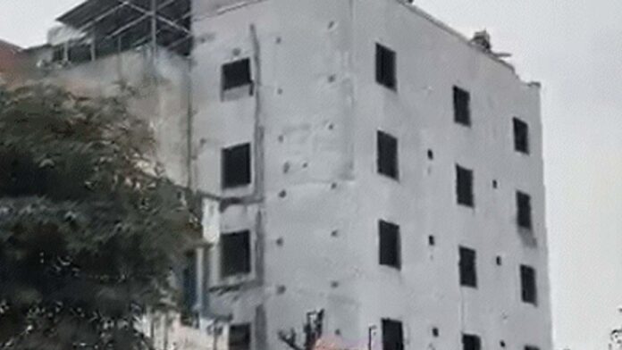 Panic ensued after cracks appeared in a five-story building under construction.
