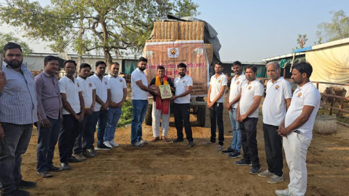 On Amavasya, a cartload of dry and green fodder was distributed to cows.