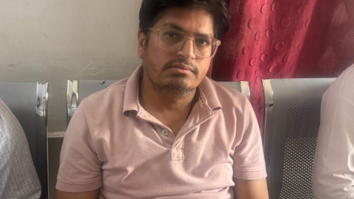 Doctor arrested for accepting bribe in exchange for medical report.