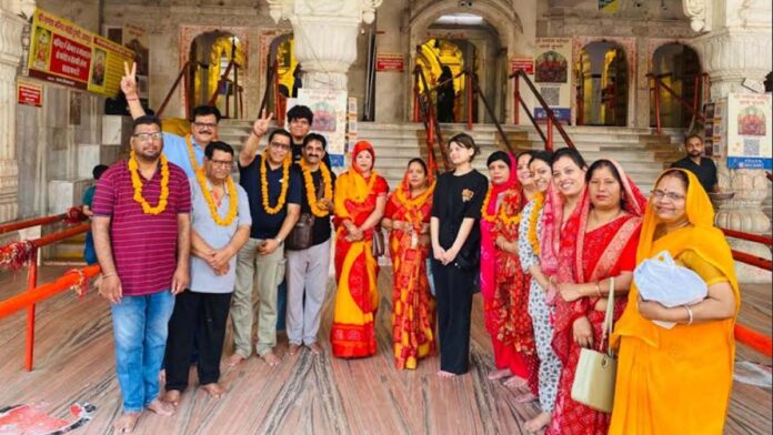A group of devotees departs from the Moti Dungri Ganesh Temple for the Char Dham Yatra. A group of devotees departs from the Moti Dungri Ganesh Temple for the Char Dham Yatra.