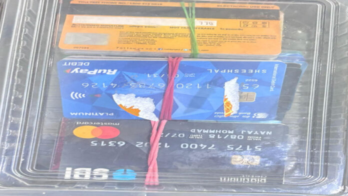 Three Cunning Frauds Arrested with 98 ATM Cards