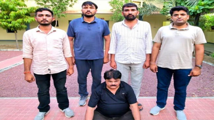 Smuggler on the run for seven years arrested in Gujarat. Smuggler on the run for seven years arrested in Gujarat.