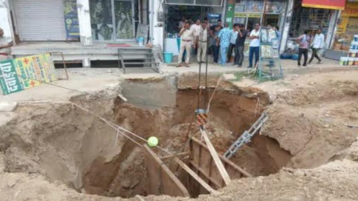 Two laborers buried in a twenty-foot-deep pit. Two laborers buried in a twenty-foot-deep pit.