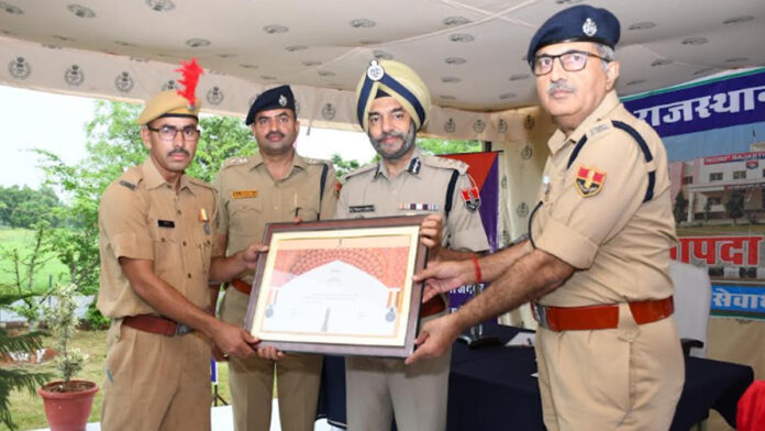ADG Rupinder Singh presented medals to 29 officers and personnel at SDRF Gadota.