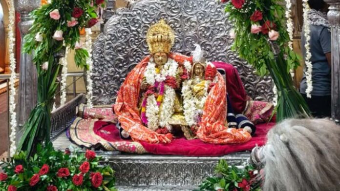 Siyaram seated on a 150-year-old silver swing. Siyaram seated on a 150-year-old silver swing.