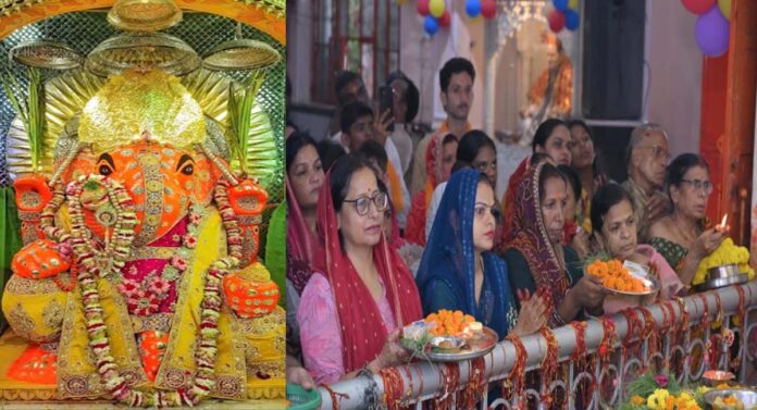 Lord Ganesha of the canal, adorned in royal attire and a gold-plated crown. Lord Ganesha of the canal, adorned in royal attire and a gold-plated crown.