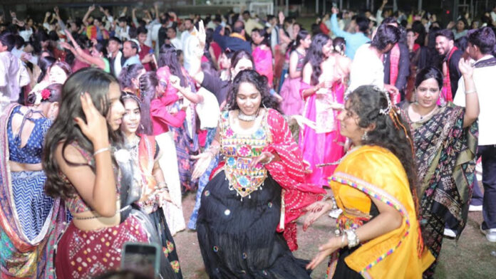 Enthusiasm surges at the vibrant, multi-colored Dandiya event. Enthusiasm surges at the vibrant, multi-colored Dandiya event.